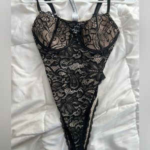 Laced body suit